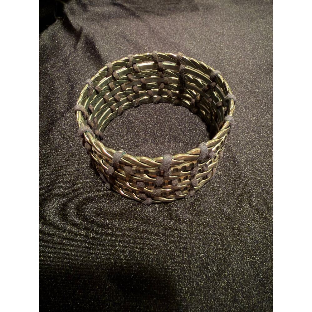Silver tone vintage cuff bracelet featuring braided metal and leather wrapped - Picture 1 of 7
